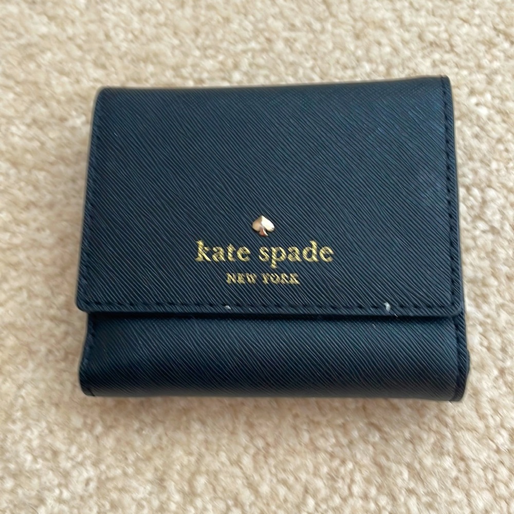 Kate Spade black nylon wallet with black polka dot interior.